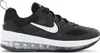 A black Nike Air Max Genome GS shoe with a white Nike swoosh logo is shown from the side against a white background. Podgląd zdjęcia produktu
