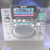 A Gemini MDJ-600 DJ media player is shown from a slightly elevated front-facing angle. Voir les images du produit