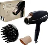 A black Panasonic hair dryer with rose gold accents, along with its accessories and packaging, is displayed against a white background. Anteprima dell’immagine prodotto