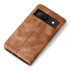A brown flip cover case for a Google Pixel 7a phone, shown from a diagonal top-down view on a white background. Produktbild-Vorschau