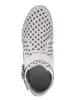 A top-down view of a white, perforated shoe. Produktbild-Vorschau