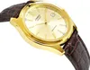 A close-up, angled shot of a gold Casio men's watch with a brown alligator-patterned leather strap against a white background. Voir les images du produit