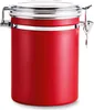 A red metal canister with a silver lid and clasp. Produktbild-Vorschau