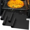 A pizza is baking in an oven, with several black grill mats laid out in the foreground. Produktbild-Vorschau