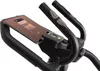 Close-up of the console of an elliptical trainer with a tablet mounted. Podgląd zdjęcia produktu
