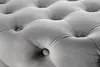 A close-up view of a tufted upholstered surface, likely a bench or ottoman, with button details. Produktbild-Vorschau