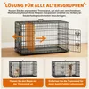 A dog crate with a movable divider, shown with text explaining its features and benefits. Below are two smaller images showing the crate with a puppy in a smaller section and then a larger section. Produktbild-Vorschau