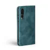A teal flip case for a smartphone is shown against a white background. Produktbild-Vorschau