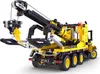 A yellow and black toy tow truck with a crane. Náhľad obrázku produktu