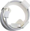A white USB-C charging cable coiled and held by white cardboard packaging. Produktbild-Vorschau
