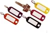 A key with several colorful key tags attached. Náhled obrázku produktu