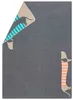 A folded blanket with a dachshund pattern on a gray background. Produktbild-Vorschau