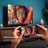 A person is holding a smartphone in front of a TV screen, demonstrating seamless streaming. Produktbild-Vorschau