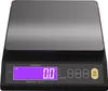 A black digital kitchen scale with a stainless steel weighing platform and a purple LED display. Náhľad obrázku produktu