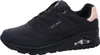 A side view of a black Skechers women's sneaker with rose gold accents. Voir les images du produit