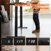 A person standing at a standing desk with digital displays showing features. Podgląd zdjęcia produktu