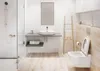 A modern bathroom with a toilet, sink, and shower. Náhľad obrázku produktu