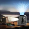 Camping scene with a power bank, phone, and mug on a wooden table. Produktbild-Vorschau