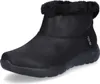 A black boot with faux fur trim is shown against a white background. Voir les images du produit