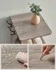 Collage showing a wooden shoe rack with hooks and a decorative vase, with close-ups of its water-resistant and durable surface. Produktbild-Vorschau