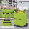 A green shopping trolley filled with groceries, placed on a paved surface in front of a house. Produktbild-Vorschau