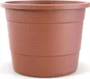 A terracotta-colored plastic planter pot with horizontal ridges. Produktbild-Vorschau