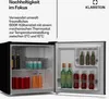 A mini-refrigerator with its door open, showing various beverages inside. The left side of the image contains marketing text about sustainability. Produktbild-Vorschau