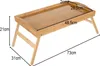 A wooden lap desk with dimensions indicated by measurement lines and text. Produktbild-Vorschau