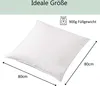 A white pillow is shown diagonally with dimensions and weight information. Produktbild-Vorschau