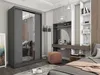 A bedroom scene featuring a large wardrobe, a vanity area with a mirror, and a bed. Produktbild-Vorschau