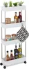 A white rolling cart with four shelves, stocked with various kitchen items and decorative plants. Produktbild-Vorschau