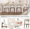 A collage of images showing modern counter height bar stools in a kitchen setting and close-ups of their features. Anteprima dell’immagine prodotto