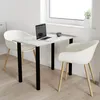 A small dining table with two chairs in a bright, modern room setting. Produktbild-Vorschau