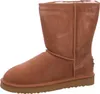 A single brown boot on a white background. Anteprima dell’immagine prodotto