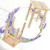 Two wooden stools are shown against a white background with a lavender floral design. Voir les images du produit