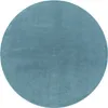 A round, blue rug on a white background. Produktbild-Vorschau