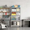 A garage or workshop setting with a car, shelving units, and tools. Produktbild-Vorschau