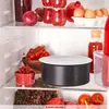 Inside a refrigerator, showing various food items and a cooking pot. Anteprima dell’immagine prodotto