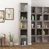 A modern living room with a tall, narrow bookshelf unit filled with books and decorative items, next to a wall with framed artwork. Produktbild-Vorschau