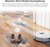 A robot vacuum cleaner is shown navigating around obstacles on a wooden floor, with visual cues indicating its obstacle avoidance technology. Produktbild-Vorschau