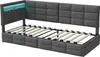 A gray upholstered bed frame with a slatted mattress base and integrated LED lighting. Produktbild-Vorschau
