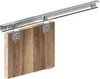 A sliding door track system with a wooden panel attached. Produktbild-Vorschau