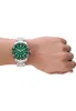 A watch on a person's wrist. Produktbild-Vorschau