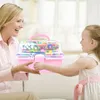 A mother is handing a craft kit to her daughter. Produktbild-Vorschau