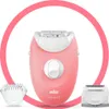 A pink Braun Silk-épil 3 epilator is shown with two attachments, set against a white background and framed by a pink circle. Náhľad obrázku produktu