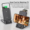 A wireless charging stand with a phone and a smartwatch on it, displaying text about its features. Produktbild-Vorschau