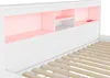 Close-up view of the headboard of a white bed frame with built-in storage and LED lighting. Voir les images du produit