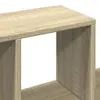 Close-up view of a wooden shelf unit. Voir les images du produit