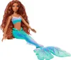 A doll with long brown hair and a mermaid tail is sitting down. Voir les images du produit