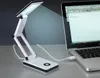 A white LED desk lamp is connected to a laptop via a USB cable. Produktbild-Vorschau